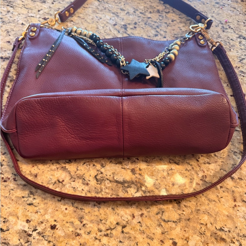 HOBO Burgundy Leather Shoulder Bag with Black Tassel and Gold Hardware - Picture 4 of 9